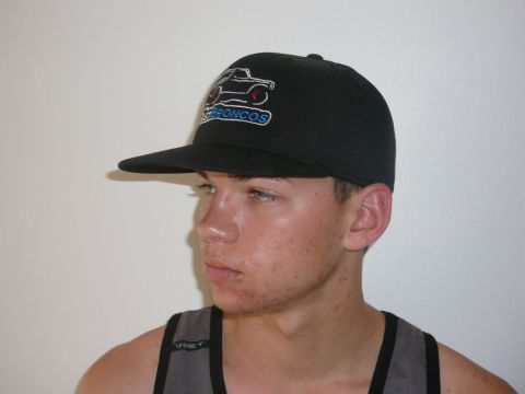 1988 Ford Bronco - A black baseball cap features an embroidered logo depicting a Bronco vehicle and the word "BRONCOS".