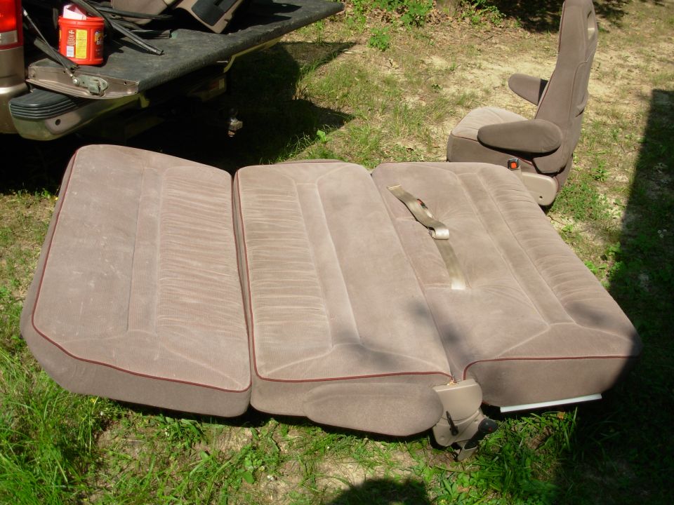 Convertible Bench/Bed from '96E150

140lbs as-is
laid flat: 56"Wx70"L (60"W w/armrests)
min. height w/o floor brackets: 10"