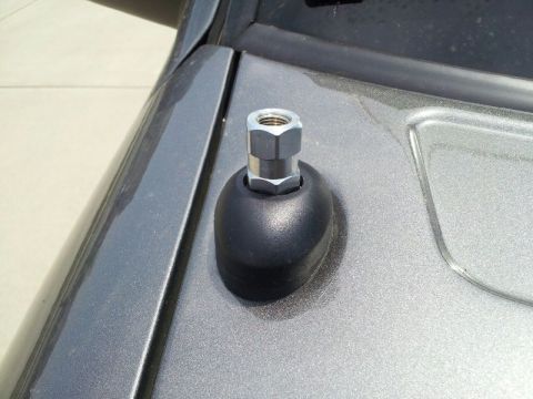 2011 Ford Ranger - Antenna base detail on a vehicle's roof panel.