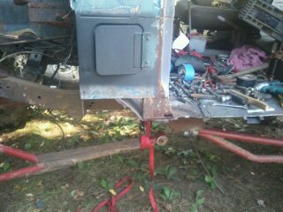 1978 Ford Bronco - This vehicle appears to be undergoing repairs or restoration in an outdoor setting.