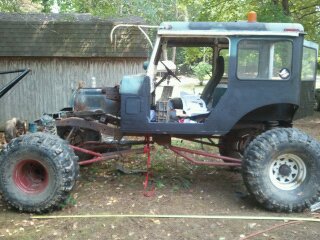 1978 Ford Bronco - This heavily modified off-road vehicle appears to be undergoing restoration or customization.