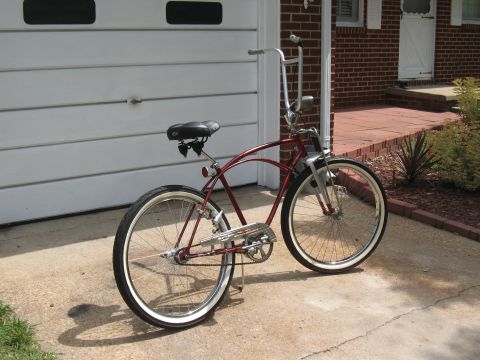 1994 Ford Bronco - A custom bicycle with a retro design sits on a concrete driveway.