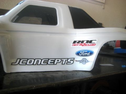 1996 Ford Bronco - This is a white RC car body with various decals, including JCONCEPTS and Ford.