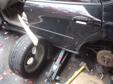 1999 Ford Taurus - This is my idea of a one-man brake bleeding operation!