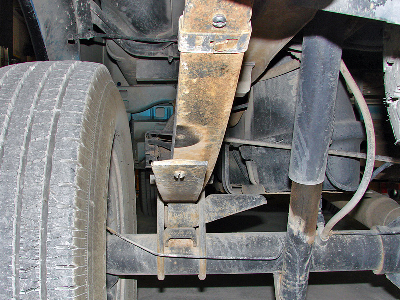 Leaf spring suspension and tire on a truck
