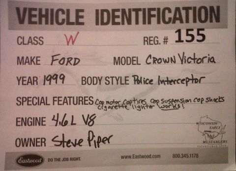 1999 Ford Crown Victoria - This is a vehicle identification document with handwritten details about a 1999 Ford Crown Victoria Police Interceptor.
