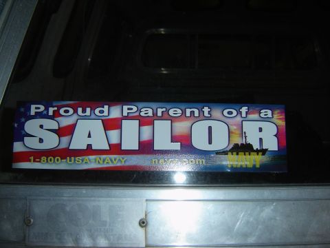1984 Ford Mustang - This bumper sticker reads "Proud Parent of a Sailor" and features a US flag and a Navy ship.