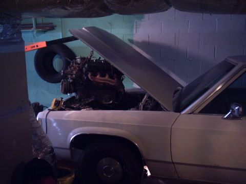1991 Ford LTD Crown Victoria - Engine removal in progress on a 1991 Ford Crown Victoria.