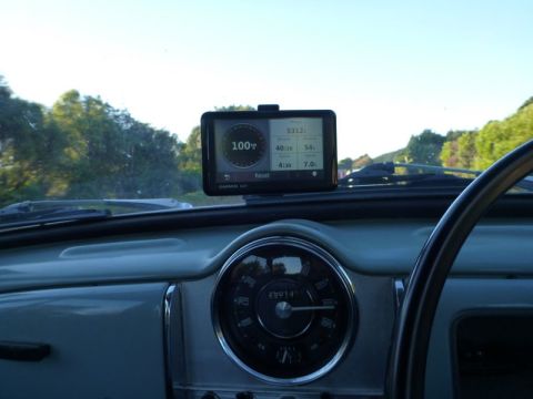 1969 MINI Cooper - Interior view of a car's dashboard, a GPS unit and a speedometer.