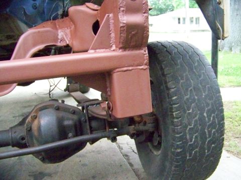 1985 Ford Bronco - Vehicle frame and suspension components, likely undergoing modification or repair.
