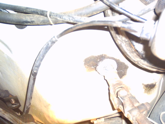Engine bay hoses and mechanical linkage