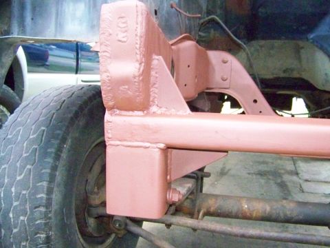 1985 Ford Bronco - Custom frame modification with suspension components and a tire visible. The registry label may be incorrect.