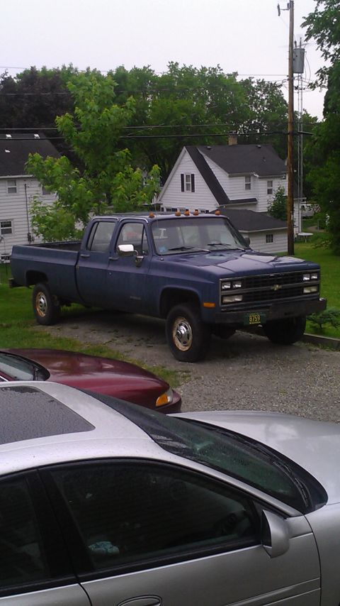 1991 Chevrolet Cheyenne - This 1991 Chevrolet Cheyenne crew cab pickup truck is seen from a 3q front angle.