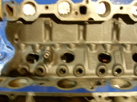 1967 Ford F-250 - Detail of an engine block, showing its internal structure and various openings.