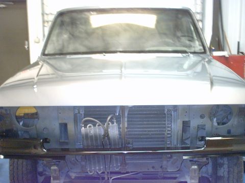 1989 Ford F-150 - Front view of a 1987 Ford F-150 during body work, radiator and AC condenser exposed.