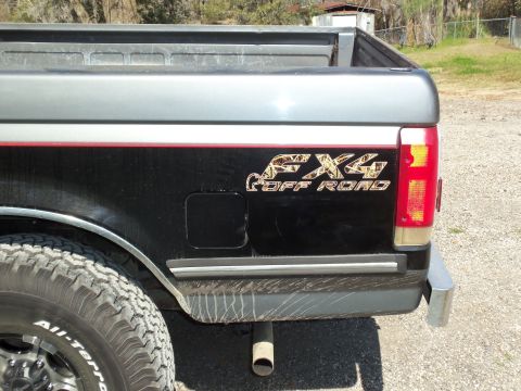 1989 Ford F-150 - Rear quarter panel detail of a 1989 Ford F-150, showing the FX4 Off Road decal.