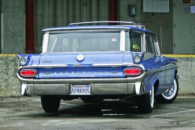 Rear view of a blue 1958 Pontiac Bonneville station wagon with a California license plate 5FMA905