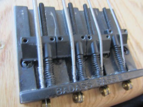 1968 Ford Mustang - The "BADASS BASS CO" bridge is a component of a bass guitar, not a car part.