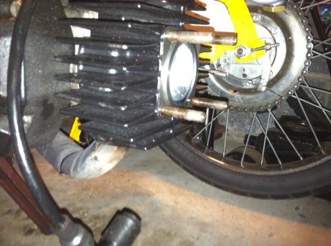 1981 Garelli Rally Sport - Close-up of a motorcycle engine cylinder and part of the rear wheel assembly.