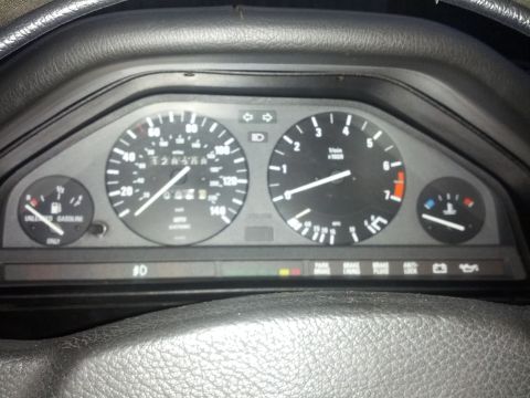 1989 BMW 3 Series - Dashboard gauges for a 1989 BMW 3 Series show an odometer reading of 128,456 miles.