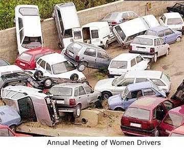 2003 Mazda 6 - A chaotic scene of wrecked vehicles in a junkyard, with the 'Super Motors' logo visible.