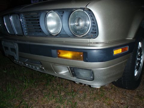 1989 BMW 3 Series - Front view of a 1989 BMW 3 Series showing the grille, headlights, and bumper details.