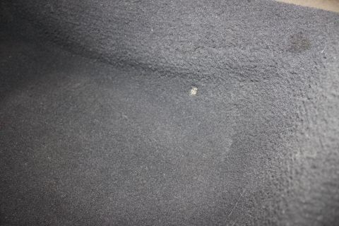 2003 Ford Crown Victoria - small burn hole on driverside rear