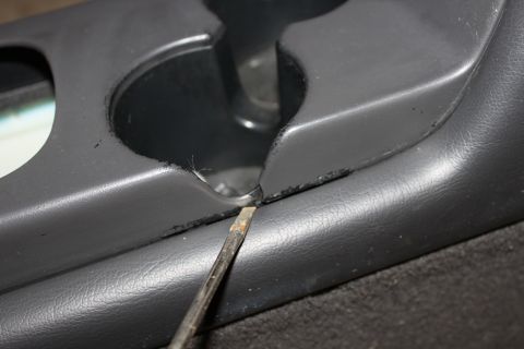 2003 Ford Crown Victoria - small crack on driverside cupholder (mostly covered when installed)