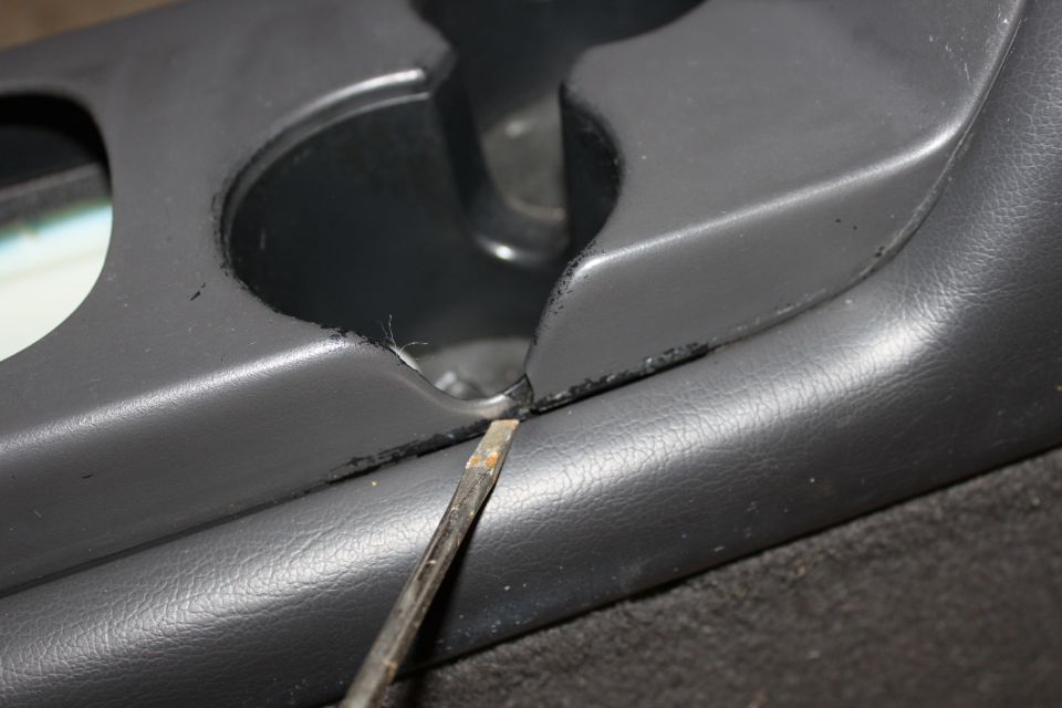 small crack on driverside cupholder (mostly covered when installed)
