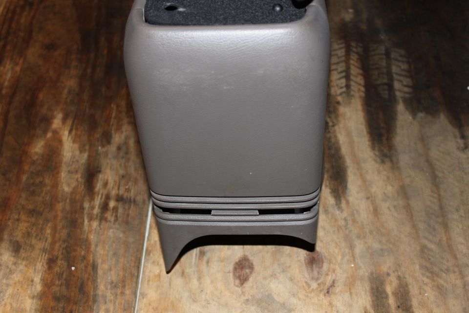 two taps broken on sport console 2003 (tan)