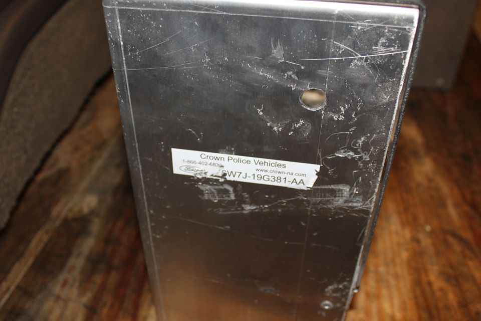 rear police perp package storage bin (passangerside) with jack hook