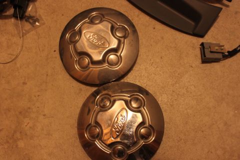 2003 Ford Crown Victoria - two police center caps.