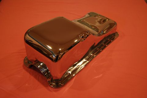 1975 Ford Ranchero - This is a chrome oil pan, likely an aftermarket part, shown on a red surface. The registry information for a 1975 Ford Ranchero does not ap…