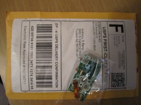 1963 Ford Falcon - Shipping envelope containing an electronic circuit board, with USPS delivery confirmation and postage details visible.