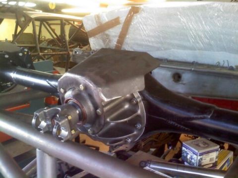 1988 Ford Bronco - Close-up of a rear axle assembly, showing the differential and driveshaft connections.