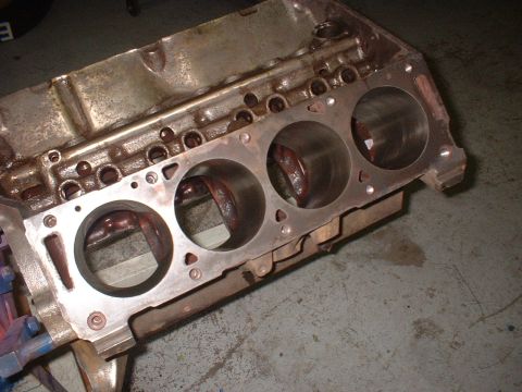 1967 Ford Mustang - Close-up view of an engine block, showing the cylinder bores and internal components.