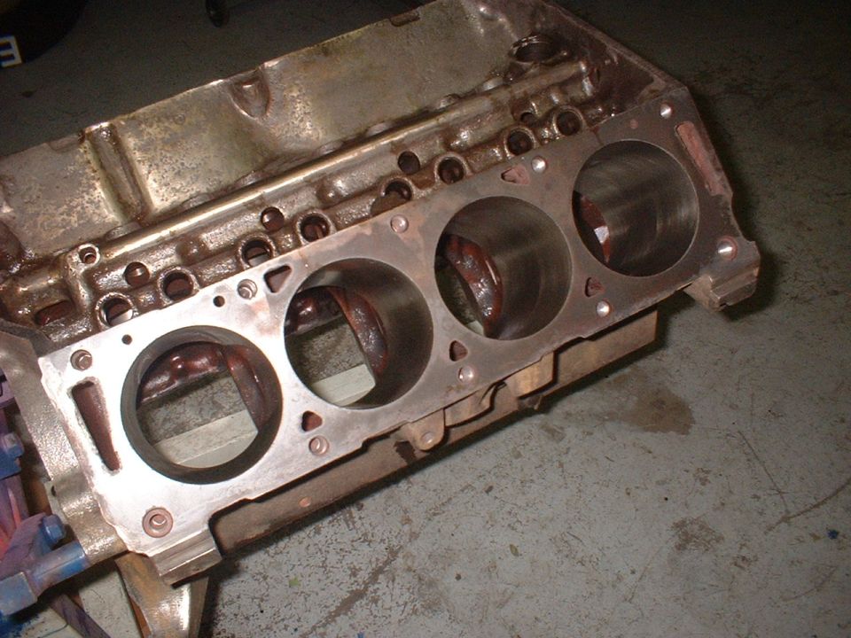 Engine block with four cylinders visible