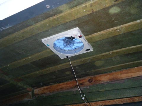 1988 Ford E350 - A ceiling fan is installed in the interior of a vehicle, likely a van or RV.