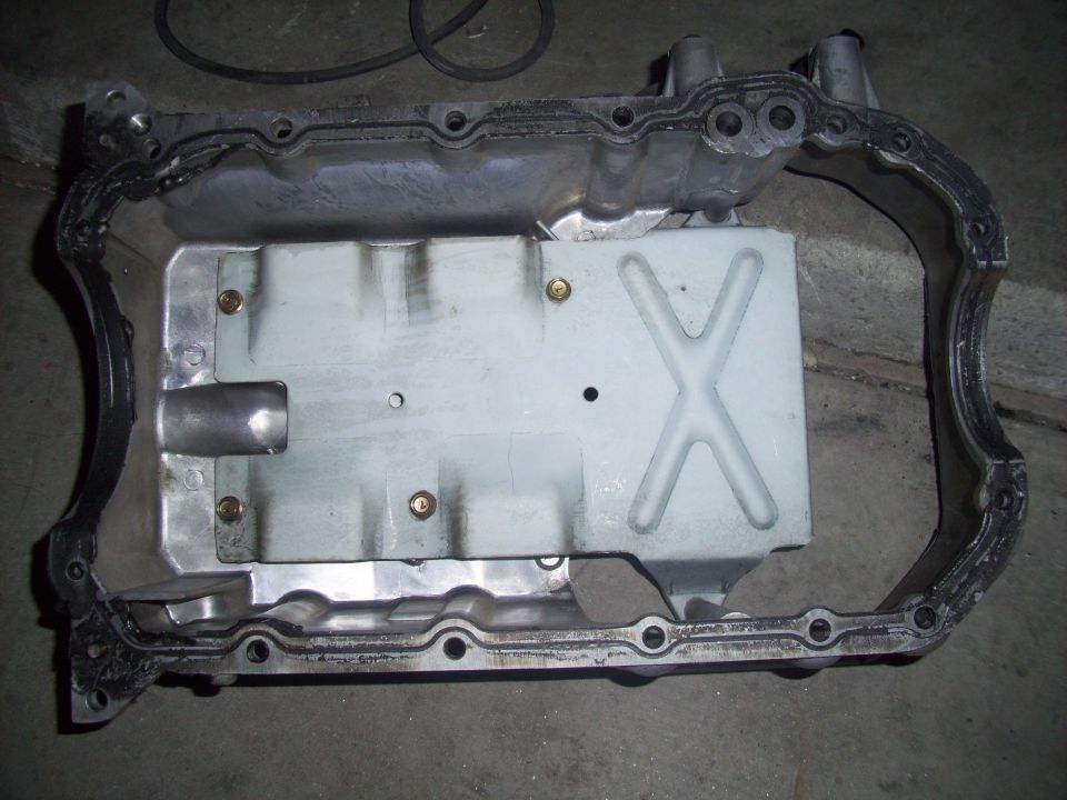 Aluminum oil pan with gasket and internal baffling