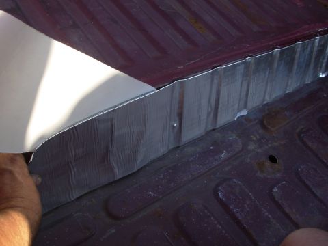 1983 Ford Bronco - By leaving the backing on & holding tension where the strip goes, it's easier to place it in all the corrugations.