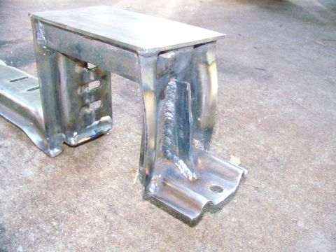 1985 Ford Bronco - This custom-fabricated metal bracket appears to be part of a vehicle modification or repair project.