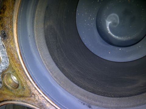 1986 Ford Bronco - This image shows the interior of an engine cylinder, revealing wear and tear on the cylinder wall.