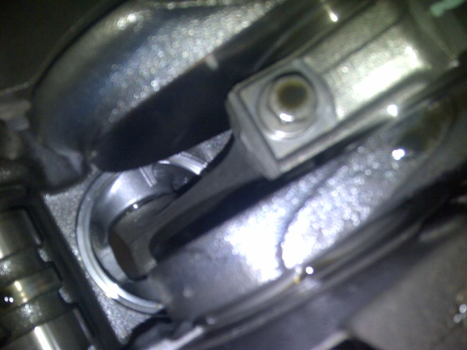 Close-up of engine connecting rod and piston