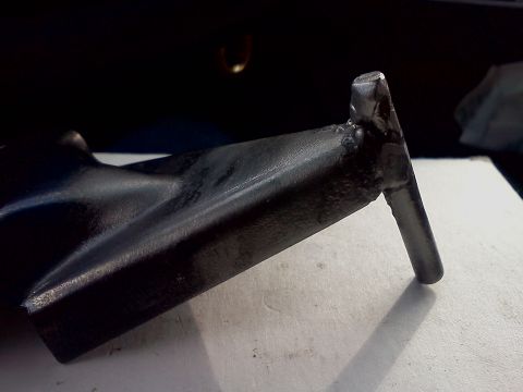 1989 Ford Bronco - A welded metal bracket is shown in detail against a neutral background.