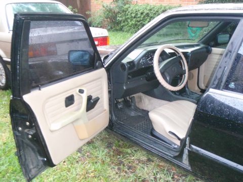 1991 BMW 3 Series - Interior view of a 1991 BMW 3 Series, showing the driver's seat and door panel.