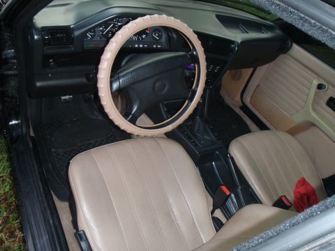 1991 BMW 3 Series - Interior view of a 1991 BMW 3 Series showing the dashboard, steering wheel, and front seats.