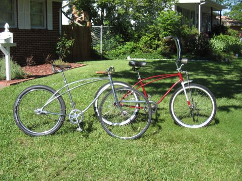 1994 Ford Bronco - Two bicycles are parked on a lawn in front of a suburban house.