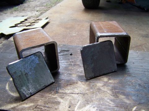 1985 Ford Bronco - Metal parts are prepared for fabrication, possibly for a vehicle modification project.