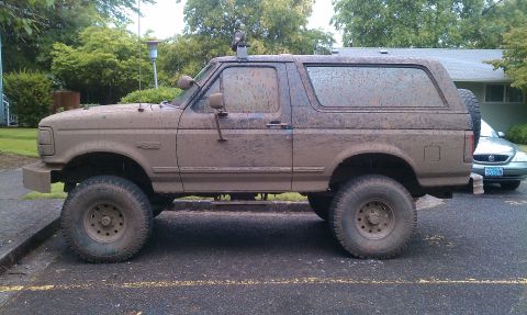 1995 Ford Bronco - This 1995 Ford Bronco is covered in mud after an off-road excursion.