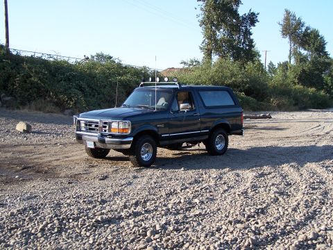 1995 Ford Bronco - This 1995 Ford Bronco is parked on a rocky surface under a clear blue sky.